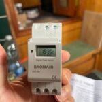 Baomain THC15A 12V programmable timer installed in Rasmunda's narrowboat electrical panel