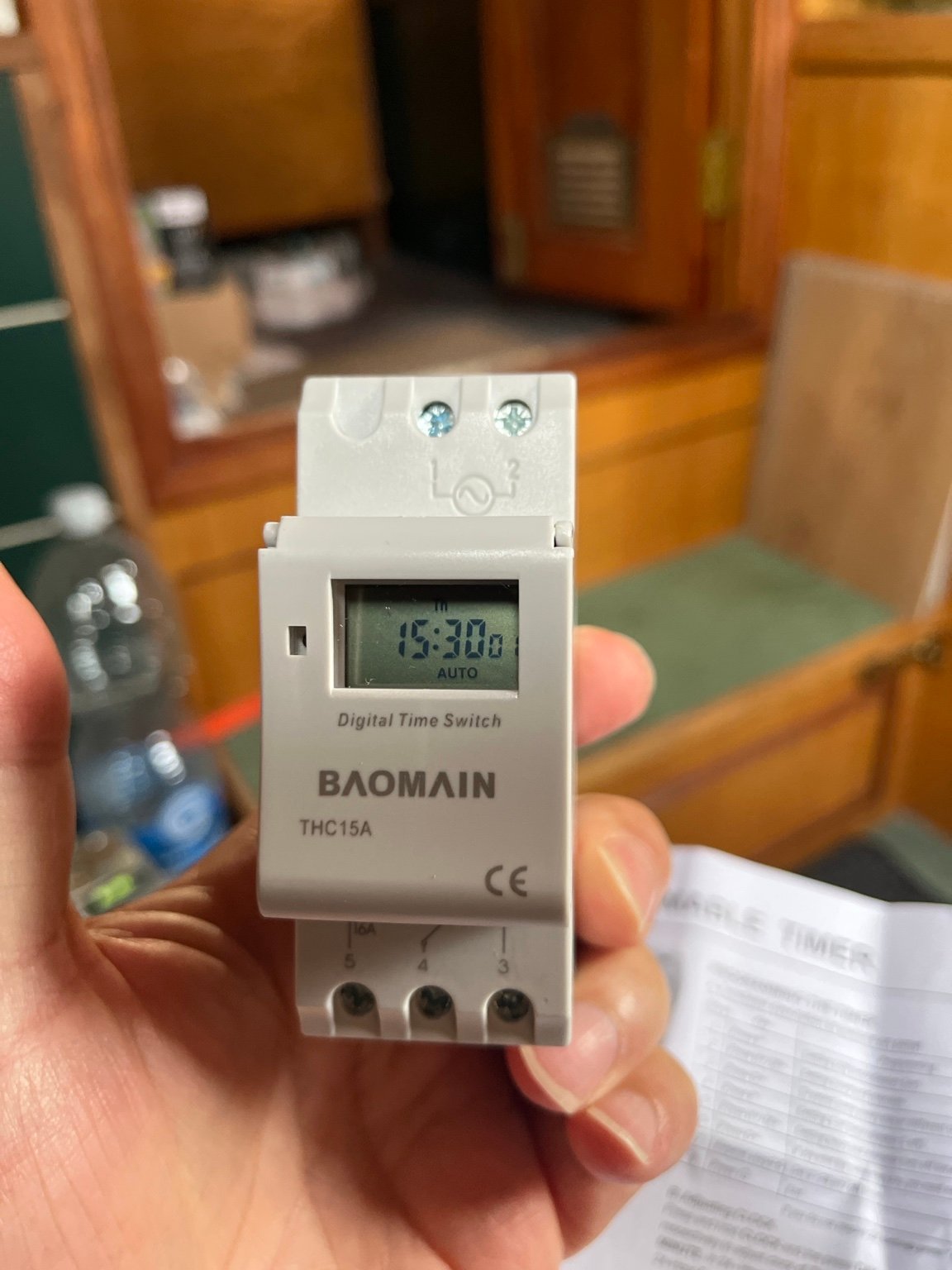 Baomain THC15A 12V programmable timer installed in Rasmunda's narrowboat electrical panel